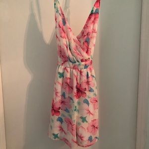 Pink blue and white flowered romper